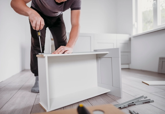 Kitchen cabinets with refreshed white cabinet doors and finishes