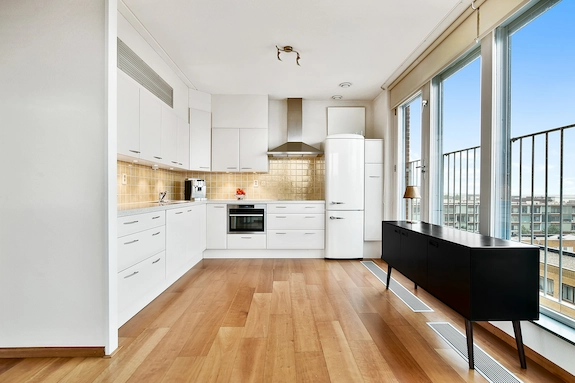 Kitchen with updated wood flooring