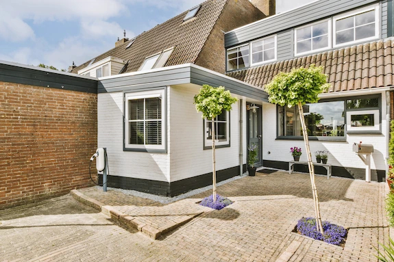Residential home addition with new windows and an extended living space