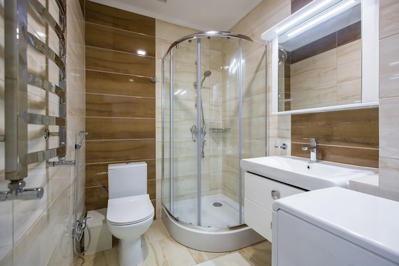 Steam Shower Installation with glass enclosure and modern bathroom fixtures.