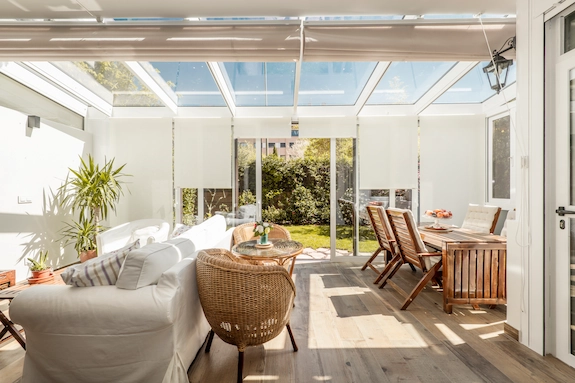 Sunroom Additions with large windows and natural light