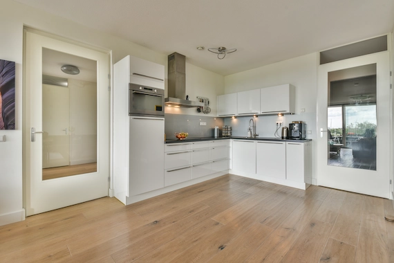 Bathrooms and kitchens with professional luxury vinyl plank (LVP) flooring installation.