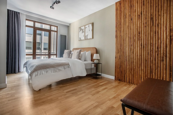 Bedrooms and hallways with professional Premium Laminate Flooring Installation.