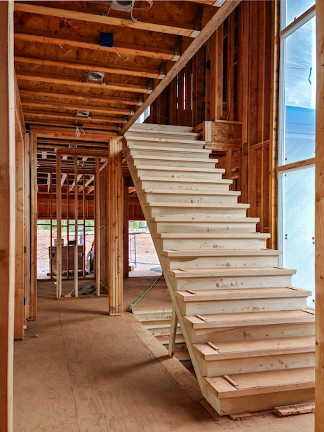 Engineered Hardwood Flooring Installation for stairs in a newly constructed home.