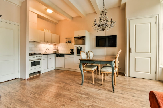 Kitchens and entryways with professional Premium Laminate Flooring Installation.